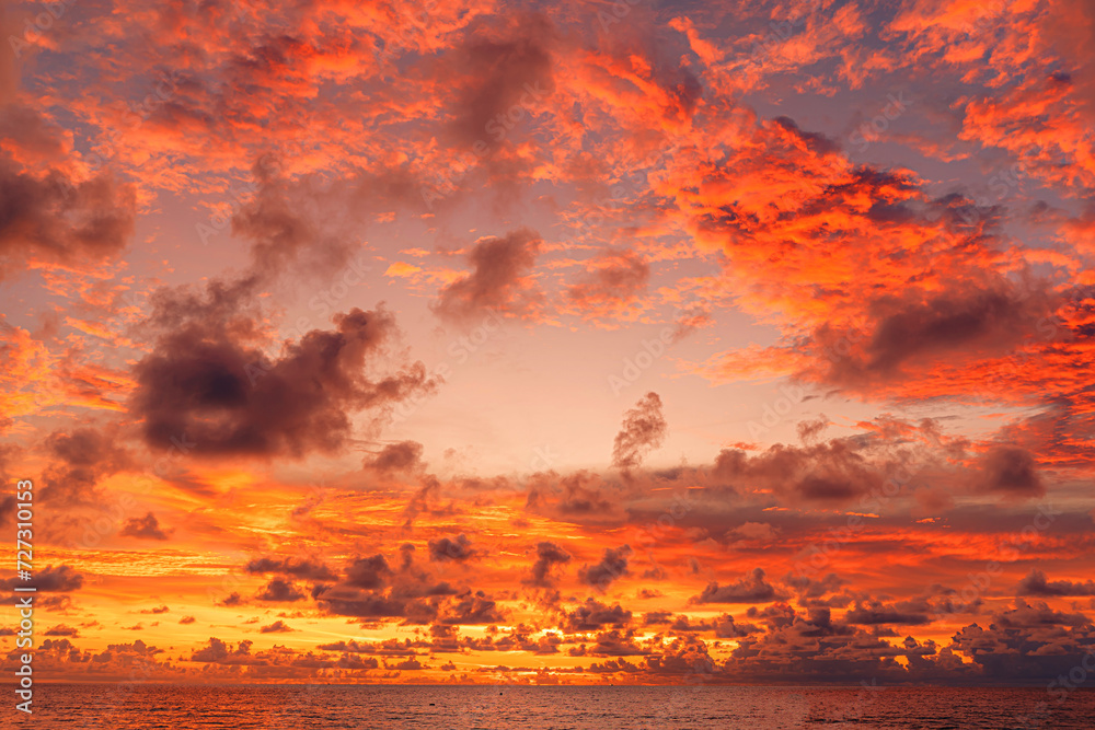 Red purple orange blue pink sunset sky cloud Red purple cloudscape background Dark red purple sunset sky cloud background day night Dramatic sunset sky Patong Phuket Thailand. Red purple orange blue pink sunset sky cloud Red purple cloudscape background Dark red purple sunset sky cloud background day night Dramatic sunset sky Patong Phuket Thailand.