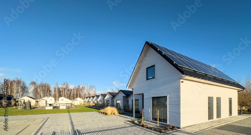 Elegant modern wooden huts or cottages in Poland, touristic accommodation © AHatmaker