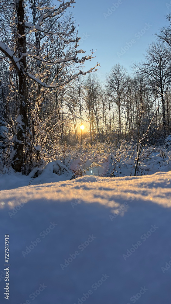 winter in the village, sunset in the snow winter in the village, sunset in the snow