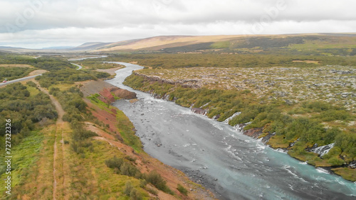 Aerial view of Beautiful blue river and rock formations at Barnafoss waterfalls in Western Iceland