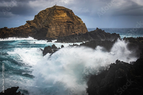 waves crashing on natural lava swimming pools of porto moniz, madeira, atlantic ocean, portugal, europe, storm, waves, lava