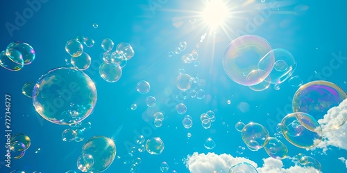 Sunshine bursting through a clear blue sky with translucent bubbles floating upward. joyful, light, and fresh scene. AI