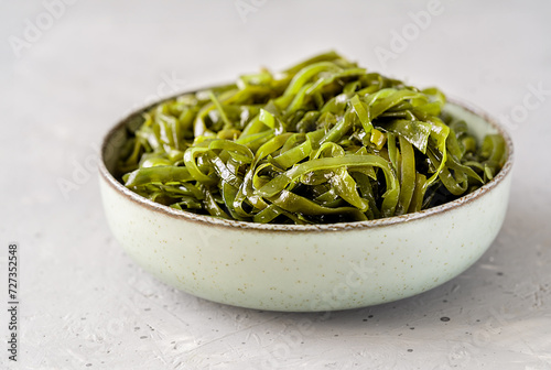 Fototapeta Naklejka Na Ścianę i Meble -  Fresh Seaweed Salad in Ceramic Bowl