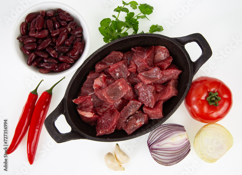 raw meat and vegetables