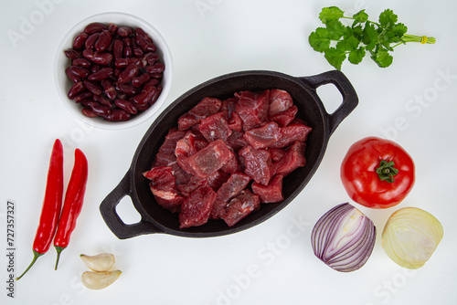 ingredients for chili con carne on white background
