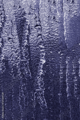 Vertical photo of frozen water leaks.