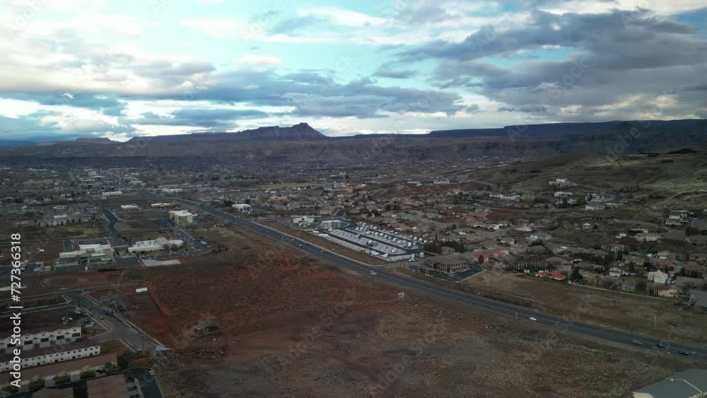 High aerial above suburbs of Hurricane Utah in winter with dramatic skies High aerial above suburbs of Hurricane Utah in winter with dramatic skies