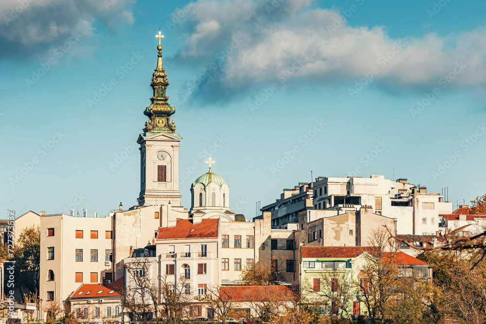 Discover Belgrade's architectural beauty, with churches and towers overlooking the scenic Danube River.