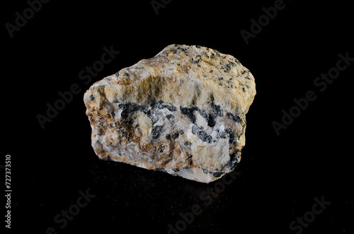 Cerussite stone mineral on black background. photo
