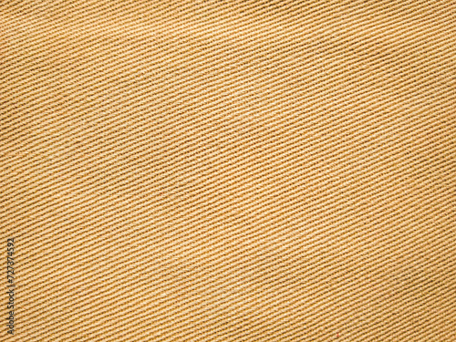 old khadi fabric texture background. light natural linen texture for the background.Golden yellow linen fabric of table cloth texture background.