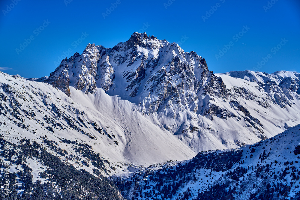 Breathtaking beautiful panoramic view on Snow Alps - snow-capped winter mountain peaks around French Alps mountains, The Three Valleys: Courchevel, Val Thorens, Meribel (Les Trois Vallees), France