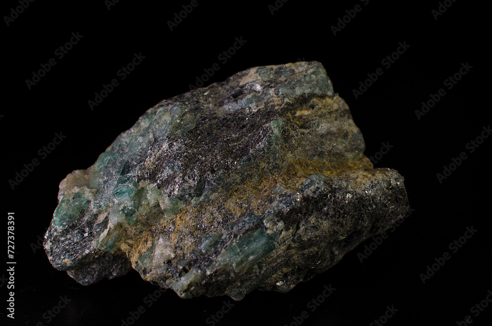 Hematite stone mineral on black background. Hematite stone mineral on black background.