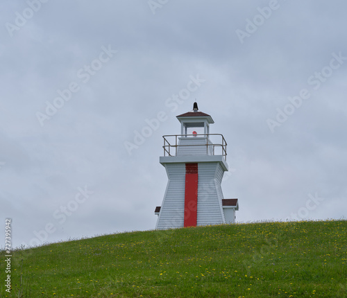 The Canadian Red and white Balache Point Lighthouse on Nova Scotia which replaced the old lighthouse