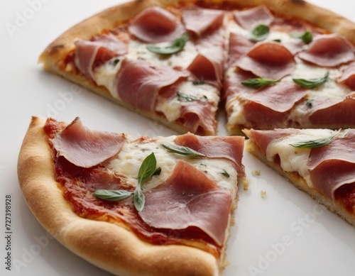 slice of Italian pizza with prosciutto on white background