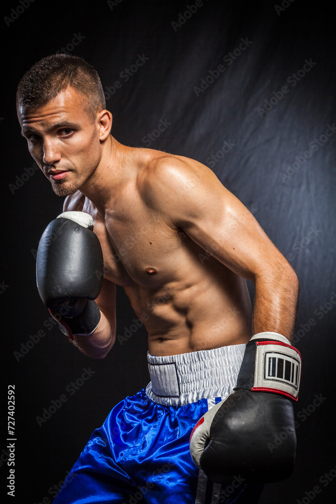 Portrait of a male boxer in guard. Portrait of a male boxer in guard.