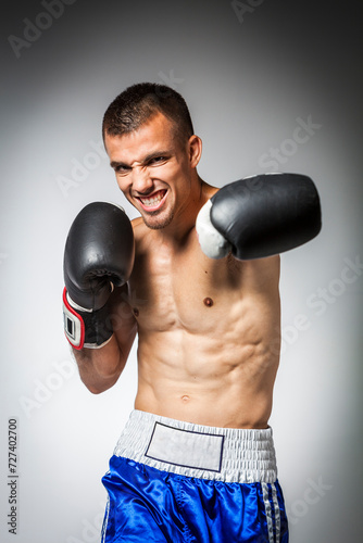 Portrait of a male boxer in guard.