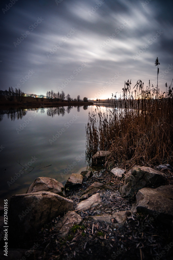 Fogy lake . Mystery lake . Frost lake . Fogy in the river . Night lake . Night photography. Beach and stones . Clouds in night Fogy lake . Mystery lake . Frost lake . Fogy in the river . Night lake . Night photography. Beach and stones . Clouds in night