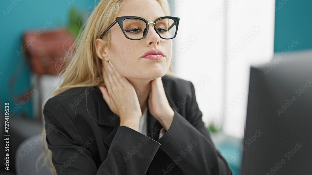 Young blonde woman business worker stressed using computer at the office Young blonde woman business worker stressed using computer at the office