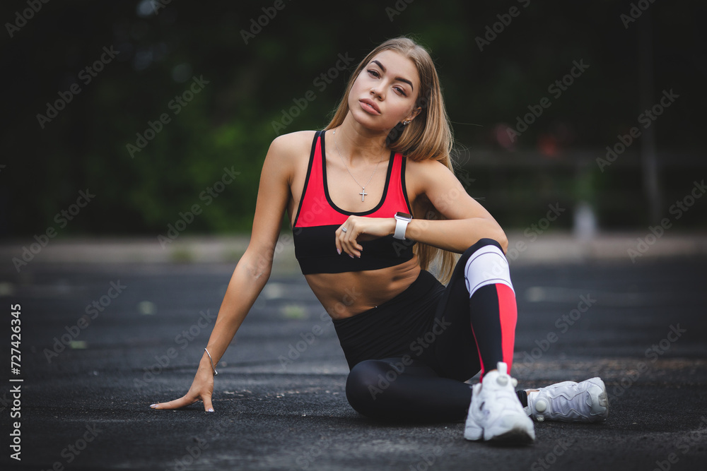 Fitness sport girl in fashion sportswear doing fitness exercise outdoor. Urban style Fitness sport girl in fashion sportswear doing fitness exercise outdoor. Urban style
