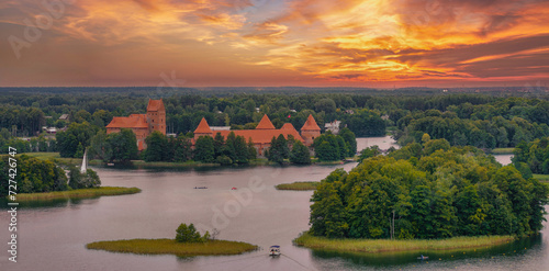 Aerial view of Trakai, over medieval gothic Island castle in Galve lake. Flat lay of the most beautiful Lithuanian landmark. Trakai Island Castle, most popular tourist destination in Lithuania photo