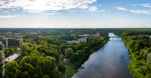 Aerial panoramic view of Lithuanian resort Druskininkai. Druskininkai in autumn colours, drone picture of multi coloured trees in most beautiful city of Druskininkai in Lithuania © Aerial Film Studio