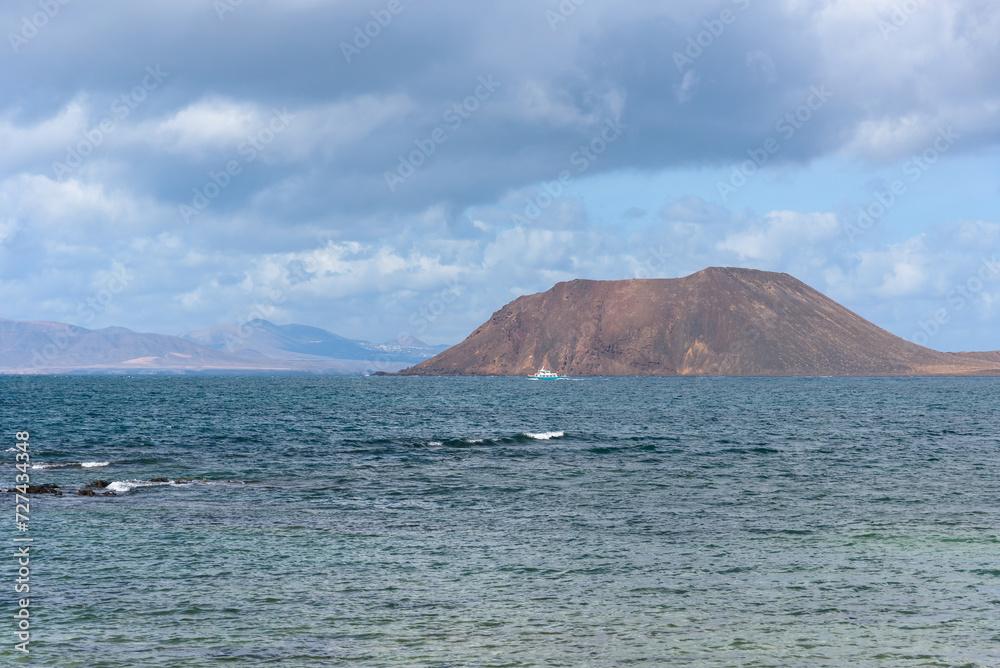 Ship in front of Lobos island on Canary Islands