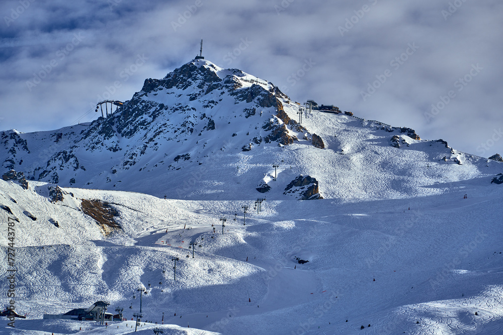 Breathtaking beautiful panoramic view on Snow Alps - snow-capped winter mountain peaks around French Alps mountains, The Three Valleys: Courchevel, Val Thorens, Meribel (Les Trois Vallees), France