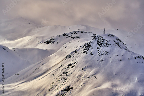 Breathtaking beautiful panoramic view on Snow Alps - snow-capped winter mountain peaks around French Alps mountains, The Three Valleys: Courchevel, Val Thorens, Meribel (Les Trois Vallees), France photo