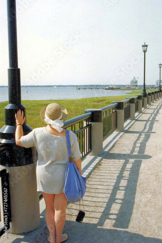 Woman, hat and sea