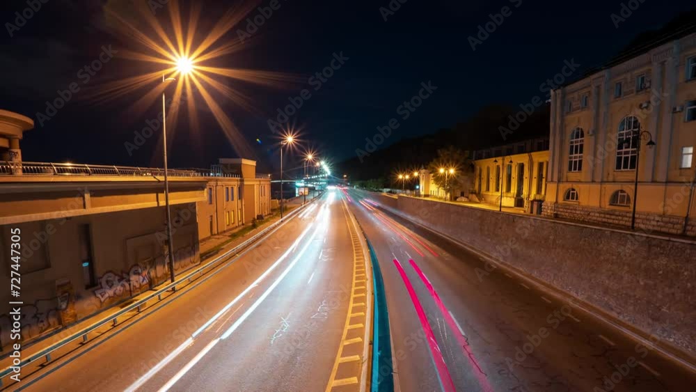 Timelapse of a busy city highway at night with beautiful bokeh lights Timelapse of a busy city highway at night with beautiful bokeh lights