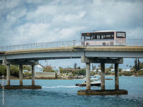  One of Bermuda's famous pink buses crossing the bridge towards Hamilton