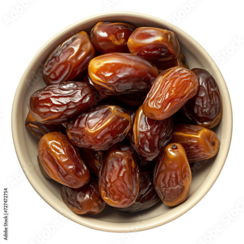 Bowl of dates isolated. Top view.
