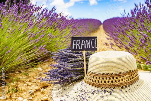 Summer hat at lavender field. Holidays in France.