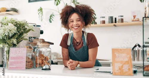 Face of woman, cafe business owner or cashier at counter for welcome, customer service and hospitality at startup. Portrait of african waitress, barista or seller at bakery, restaurant or coffee shop photo
