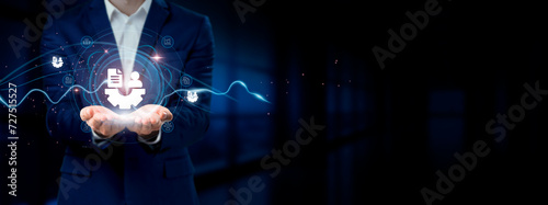 Businessman holding virtual Human Resources network connection icons. Employee Engagement, Talent Management, Workforce Connectivity. Internet business and social network. photo