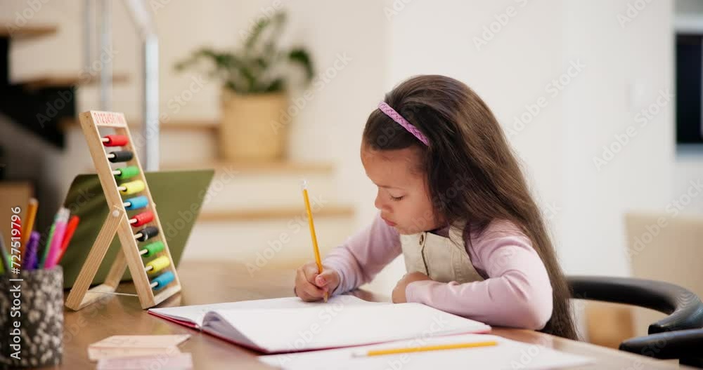 Homework, education and girl writing, learning and ideas with student and child development in a living room. Apartment, notebook and kid at a desk with a pencil and study for math and knowledge Homework, education and girl writing, learning and ideas with student and child development in a living room. Apartment, notebook and kid at a desk with a pencil and study for math and knowledge