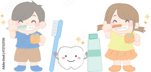 歯みがきをする男の子と女の子と歯のイラスト