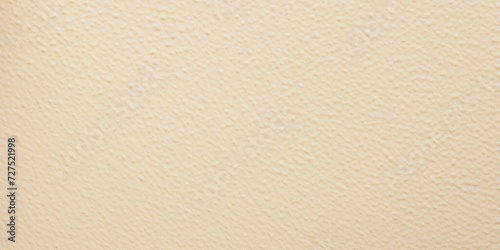 Light eggshell texture. Beige colored background with natural noise and scratches photo