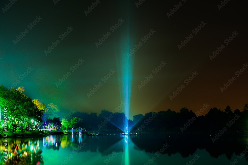 Light beam in the lake at night