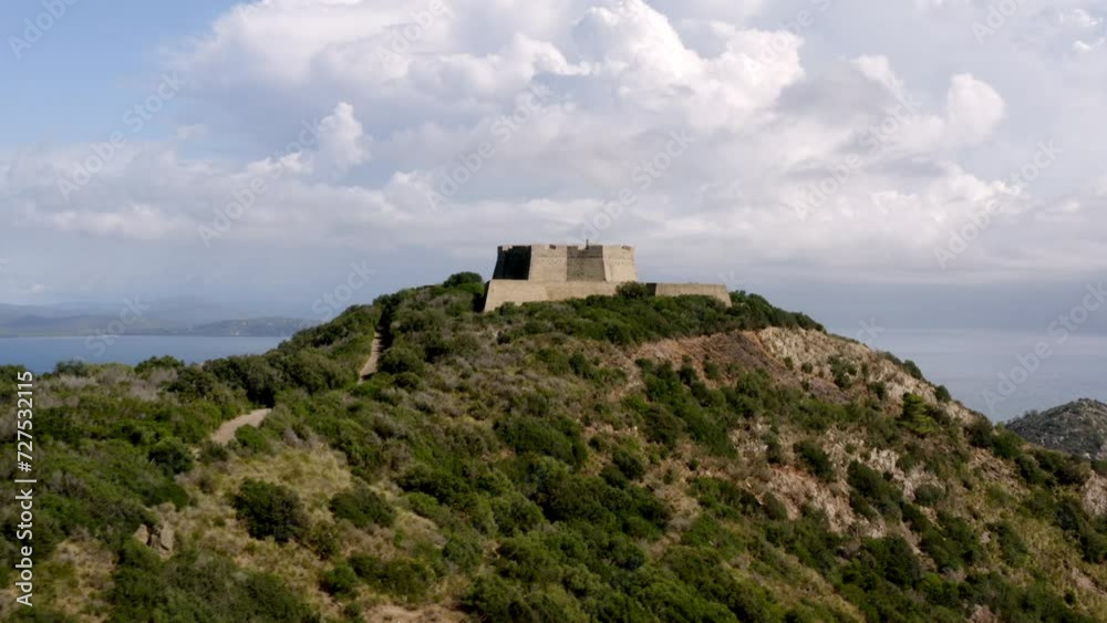 drone view of a stronghold near the sea in tuscany drone view of a stronghold near the sea in tuscany