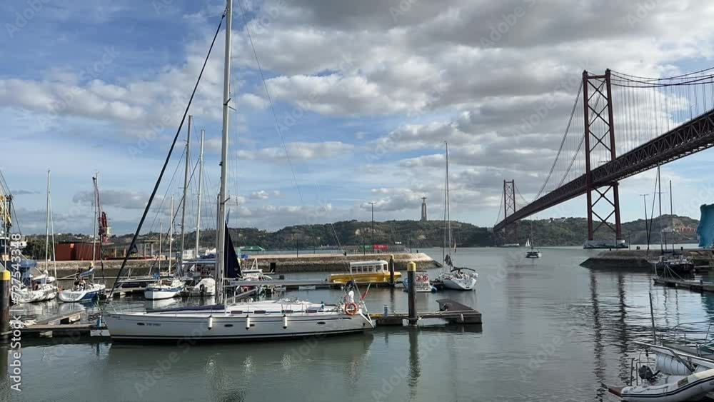Elegant Sailboats Resting in Tranquil Marina Elegant Sailboats Resting in Tranquil Marina