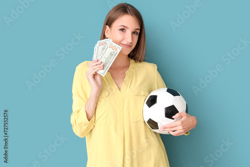 Young woman with soccer bal...