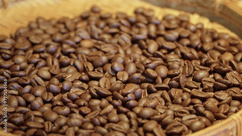 Brown Roasted Coffee Beans in Vietnamese Traditional Wooden Bamboo Bowl on Table Brown Roasted Coffee Beans in Vietnamese Traditional Wooden Bamboo Bowl on Table