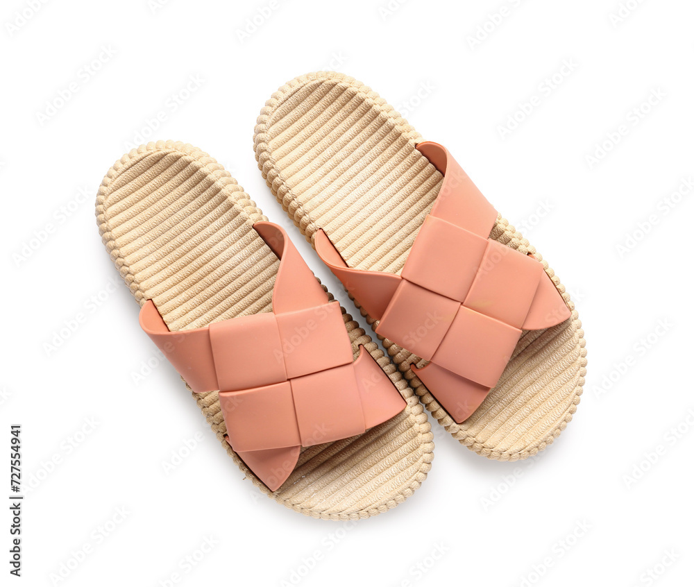 Orange female flip flops on white background Orange female flip flops on white background