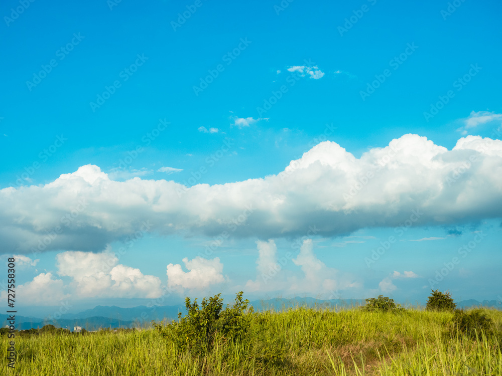 The path in the mountains with green valleys and cloudy sky The path in the mountains with green valleys and cloudy sky