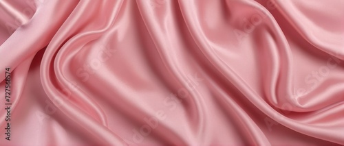 Pink silk fabric with a luxurious texture, ideal for elegant designs.