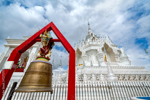 The white pagoda of Prajna Temple in Xishuangbanna, Yunnan, China. photo