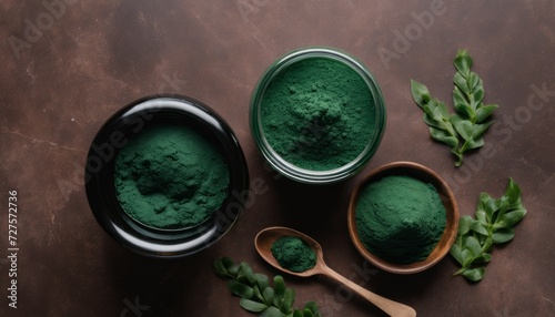 Green herbs in a bowl and a jar © vivekFx