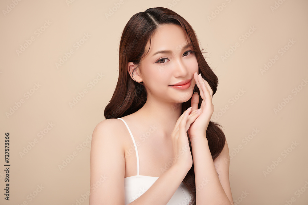 Beautiful young woman with clean fresh skin on beige background, Face care, Facial treatment, Cosmetology, beauty and spa, women portrait. Beautiful young woman with clean fresh skin on beige background, Face care, Facial treatment, Cosmetology, beauty and spa, women portrait.