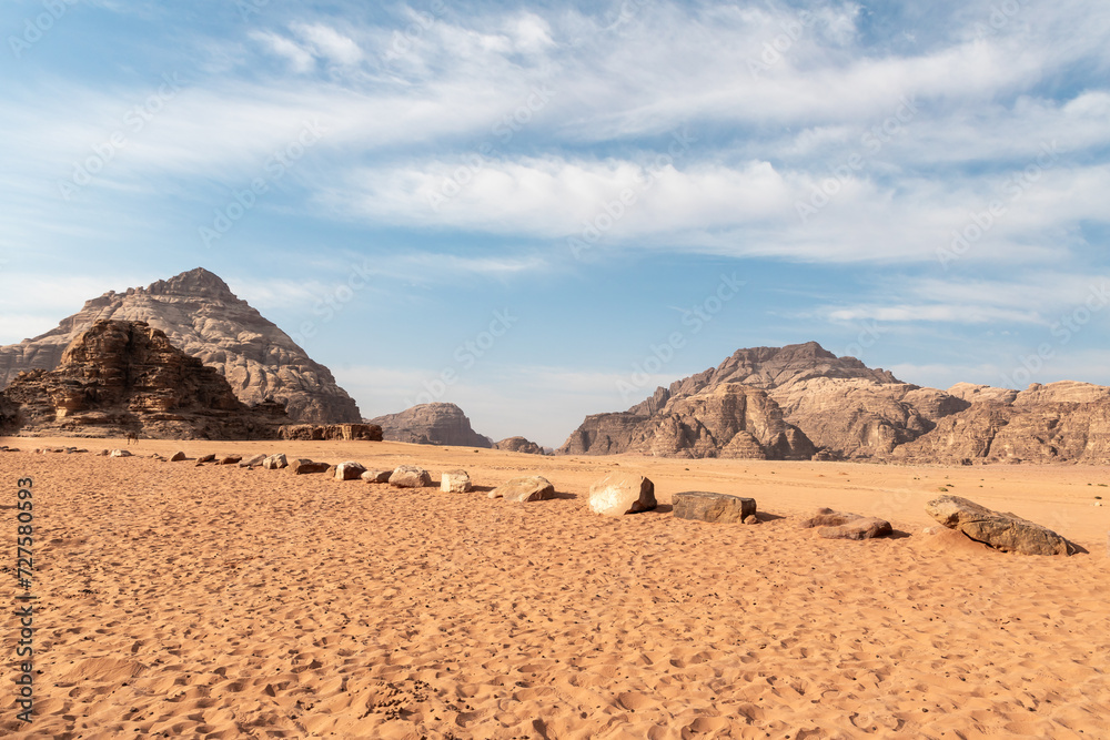 The unforgettable beauty of vast expanse of the endless sandy red desert of the Wadi Rum near Amman in Jordan
